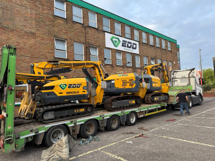 Brokks on low loader